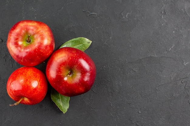 Top view fresh red apples ripe fruits on grey table tree ripe fruit mellow fresh