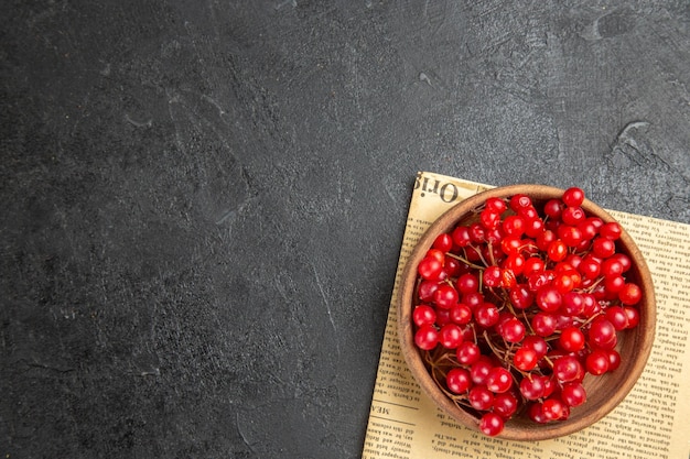 Top view fresh red cranberries on dark background