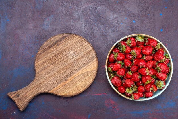 Top view fresh red strawberries mellow fruits berries on dark-blue desk berry fruit mellow summer food vitamine ripe