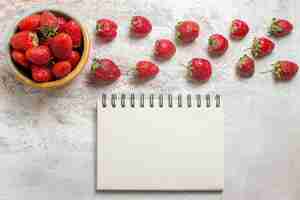 Free photo top view fresh red strawberries on white table fruit red fresh