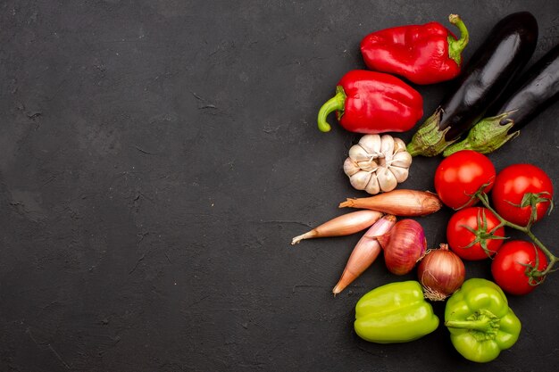 Top view fresh ripe vegetables on grey background salad meal food vegetable health ripe