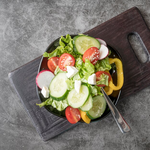 Top view fresh salad with organic vegetables