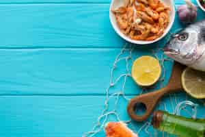 Free photo top view fresh seafood mix on table