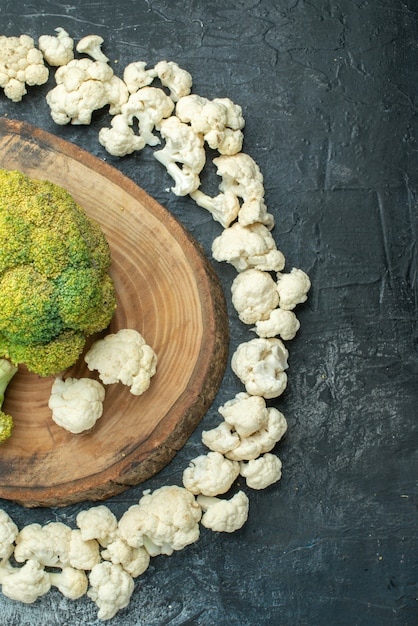 Top view fresh sliced cauliflower circled on light-grey table salad diet photo cabbage meal food