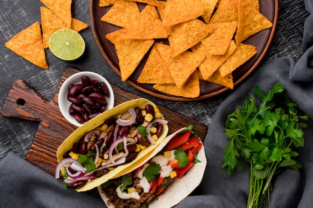 Top view fresh tacos with meat and vegetabls