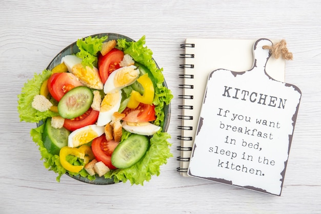 Top view fresh vegetable salad with eggs on a white background lunch ripe food breakfast salad color meal