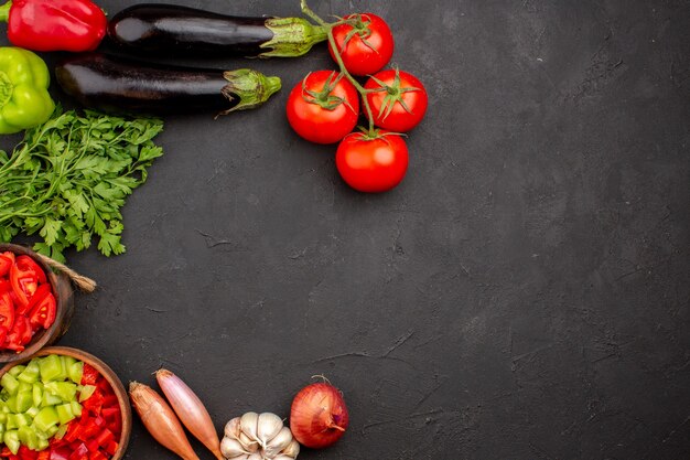 Top view fresh vegetables with greens on grey background meal salad health food