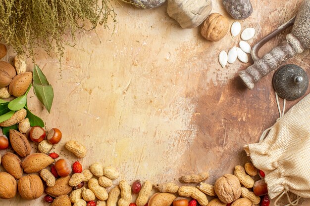 Top view of fresh walnuts lined on a wooden desk