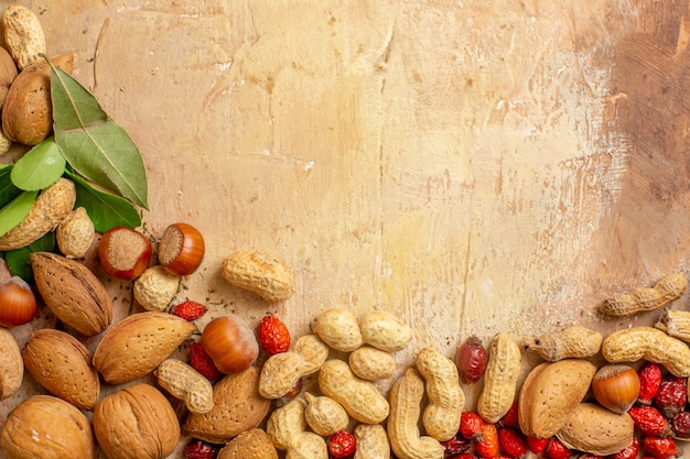 Top view of fresh walnuts lined on a wooden desk