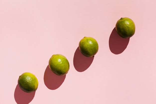 Top view fruits on pink background