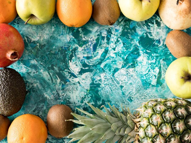 Top view of fruits on wooden background. copyspace available