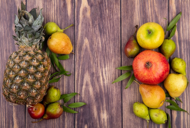 Top view of fruits on wooden surface