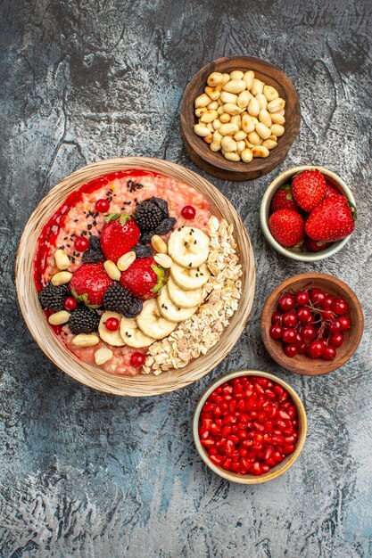 Top view of fruity muesli with fresh sliced fruits