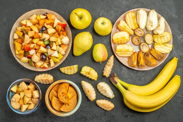 Top view of fruity salad with fresh sliced fruits