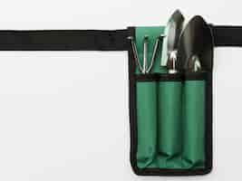 Free photo top view gardening tools on bag