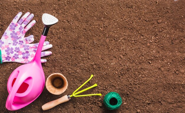 Top view of gardening tools on the ground