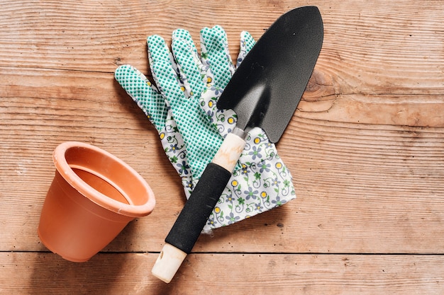 Top view gardening tools on the table