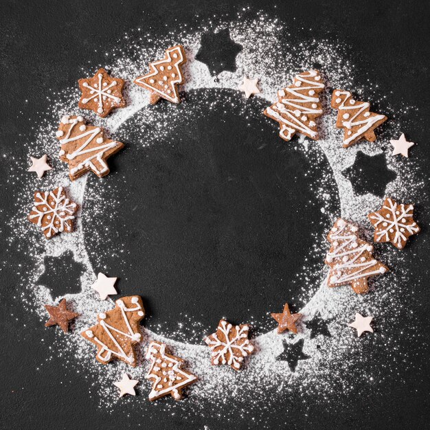 Top view of gingerbread wreath with flour