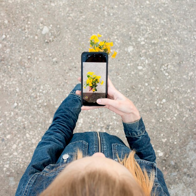 top view girl taking photo
