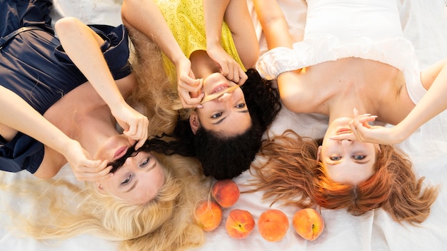 Top view of girls having fun at beach