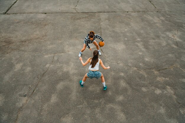 Top view of girls playing basketball