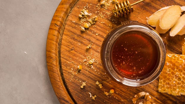 Top view glass jar full of honey