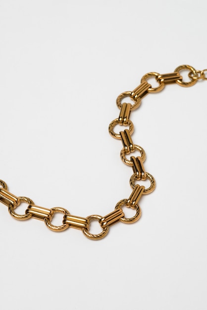 Top view gold chain on white background