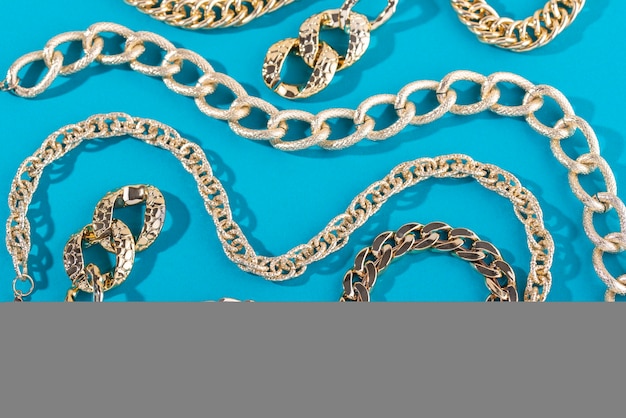 top view on gold chains still life
