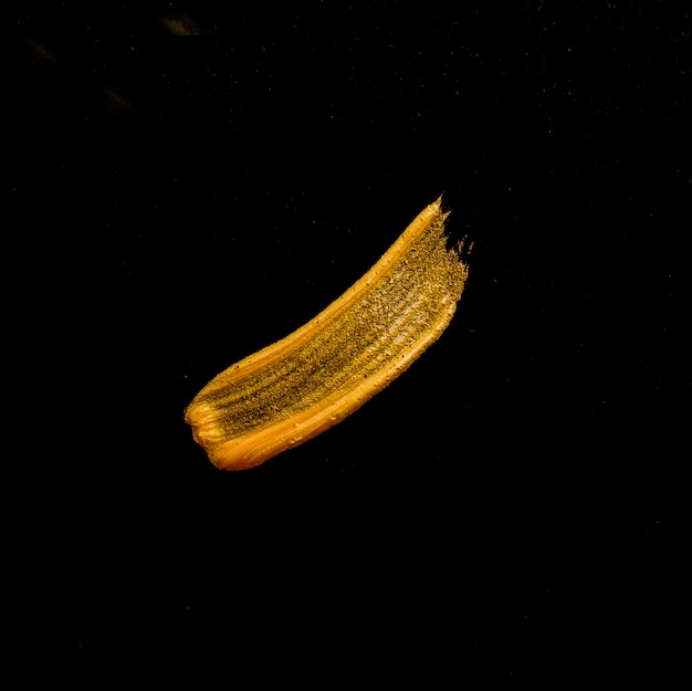 Бесплатное фото Вид сверху золотое акварельное пятно