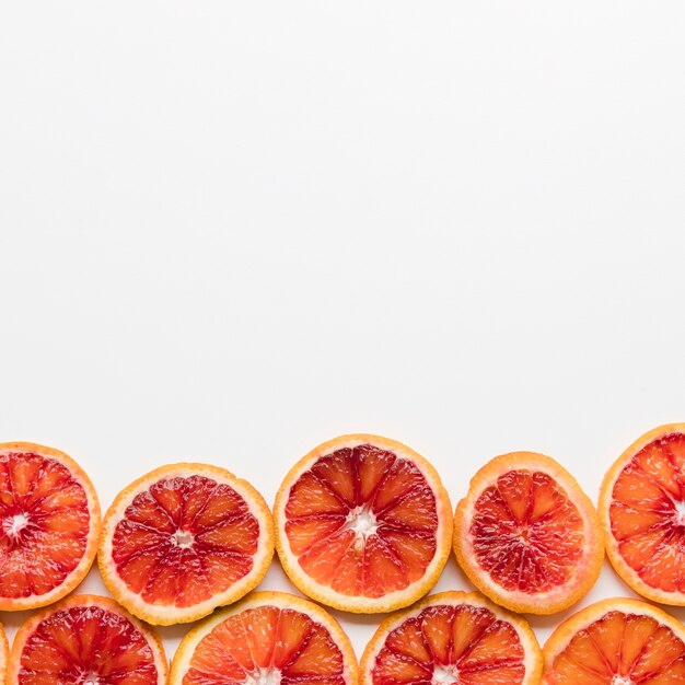 Top view grapefruit slices with copy space