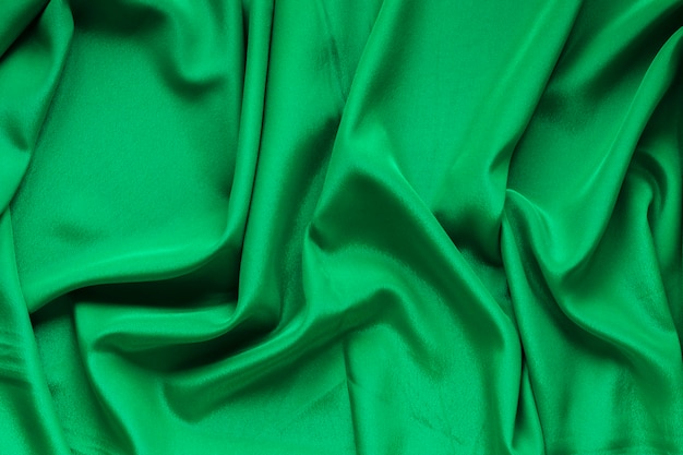 Top view of green fabric for carnival
