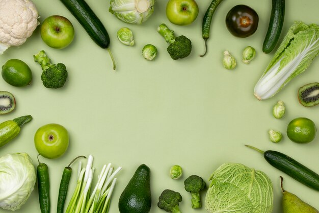 Top view green fruits and vegetables arrangement