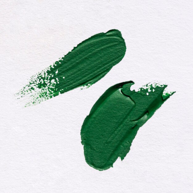 Top view of green paint brush strokes