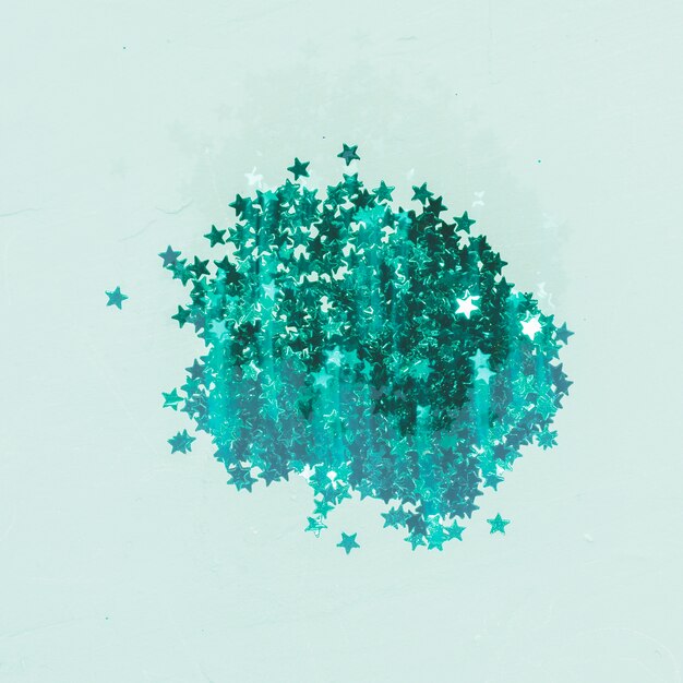 Top view green sequins pile