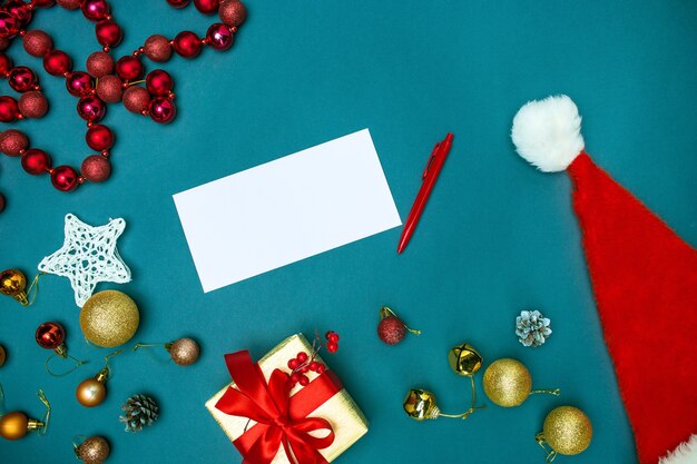 The top view of greeting card mock up template with Christmas decorations