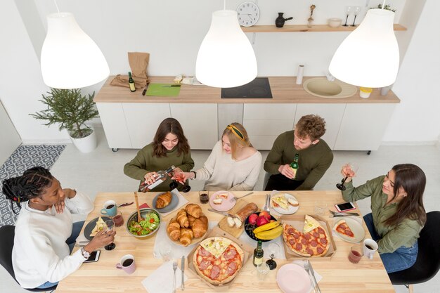 Top view group of friends eating