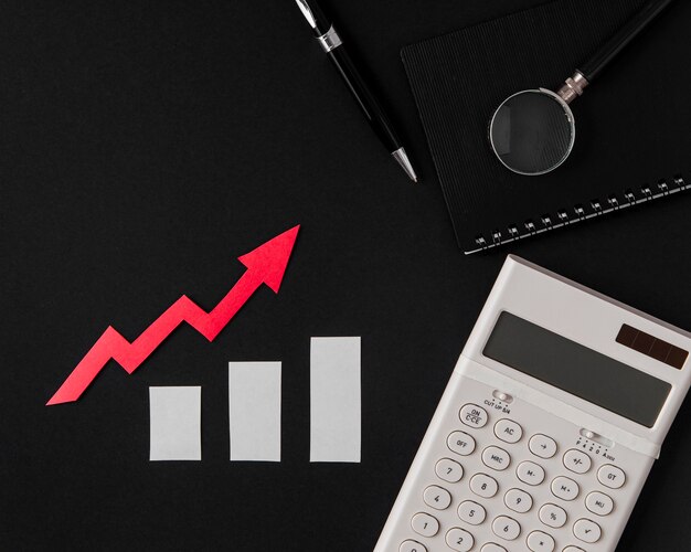 Top view of growth arrow with calculator