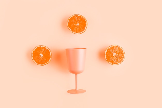 Top view half oranges with cup