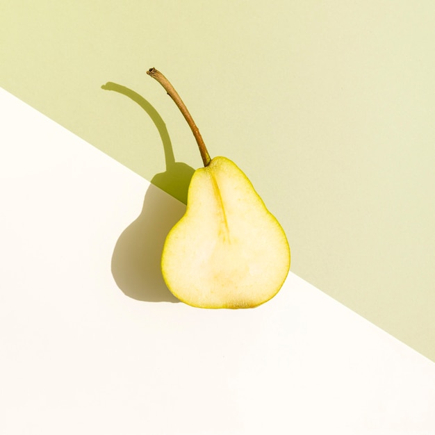 Top view half of pear with shadow