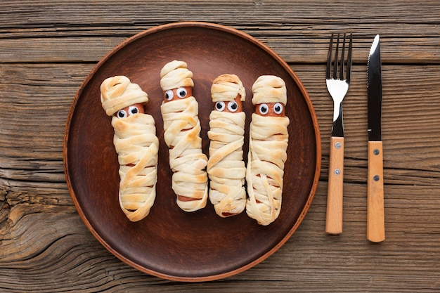 Free photo top view halloween food with cutlery