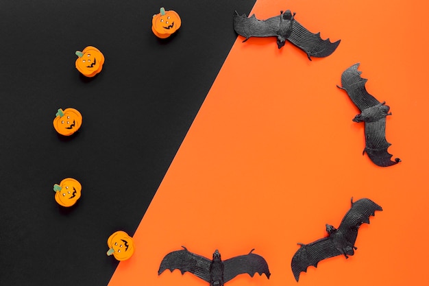 Top view halloween pumpkins and bats