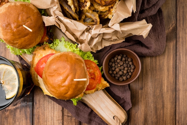 Top view hamburgers on wooden table