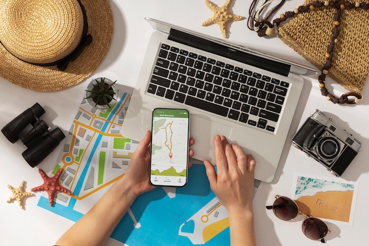 Free Photo top view hand holding smartphone