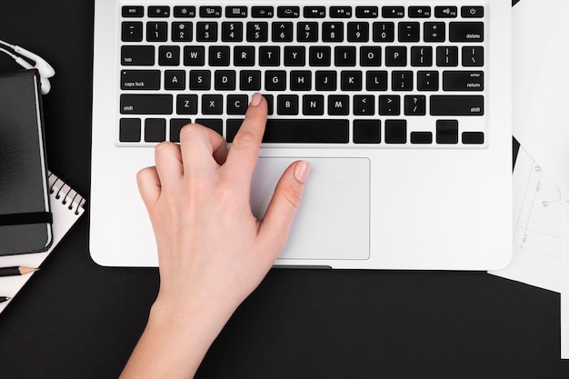 Top view of hand on laptop keyboards