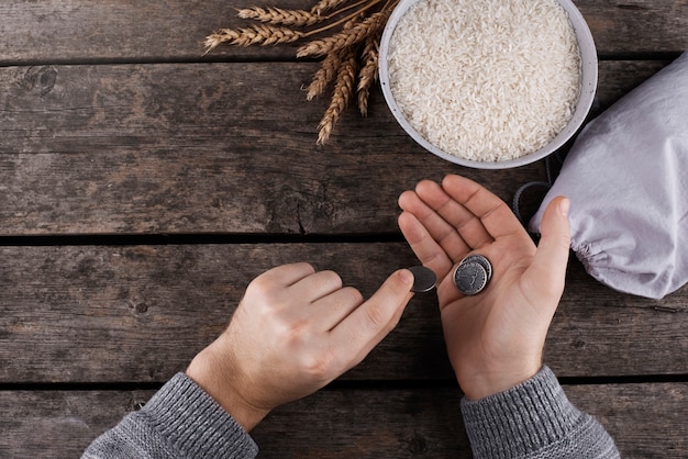 Top view hands holding coins