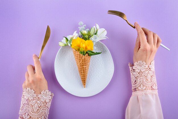 Top view hands holding cutlery