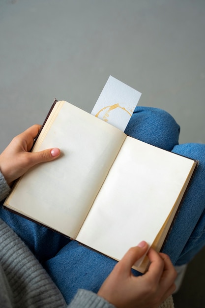 Top view hands holding notebook