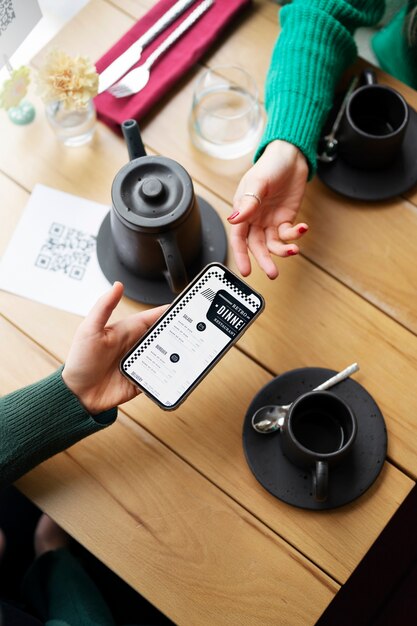 Top view hands holding smartphone