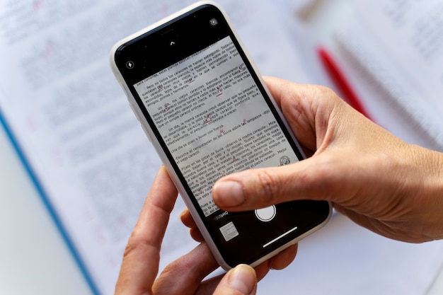 Top view hands holding smartphone