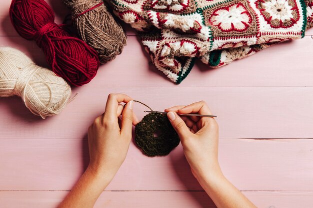 Top view of hands knitting